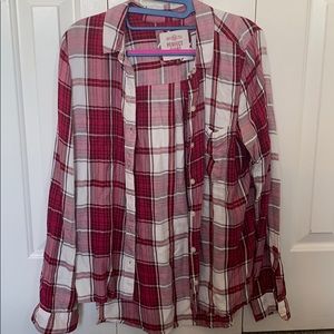 Maroon, pink and gray plaid shirt.